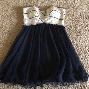 This is a navy blue & white strapless hoco dress